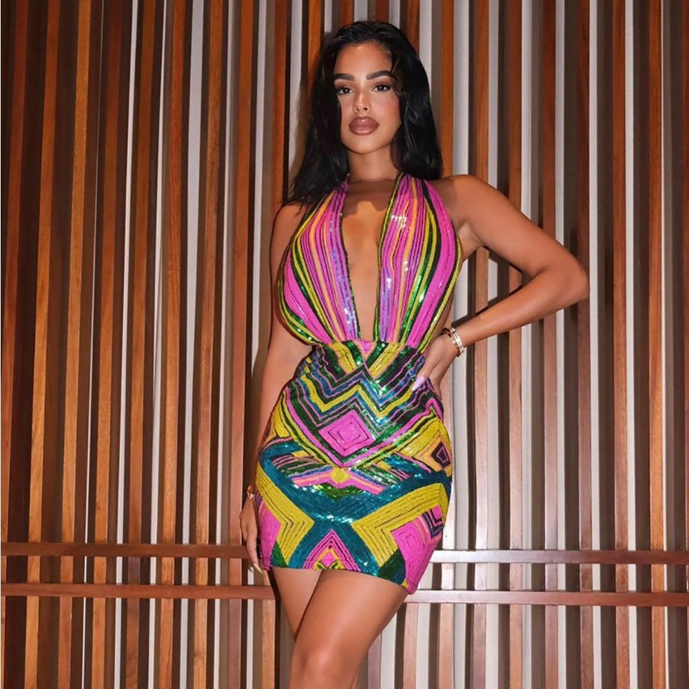 Sequin mini dress, has zipper in back. Dress length 33”